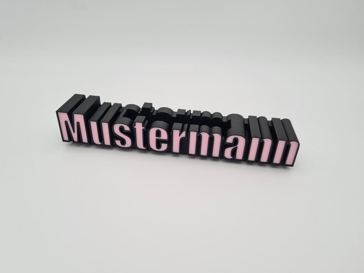 Personalisierter Visitenkartenhalter mit Schriftzug, Füllfarbe Sakura Pink (als Sonderfarbe erhältlich), Rahmen schwarz, Seitenansicht – aus mattem PLA, 3D-Druck von print3design