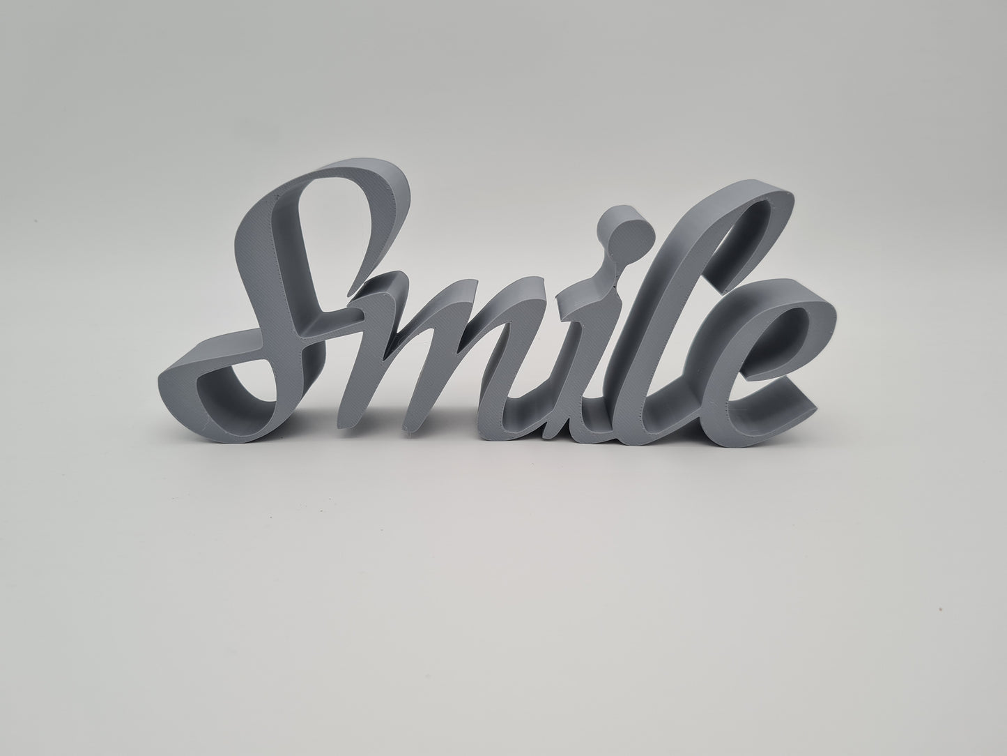 Dekorationsschriftzug Smile