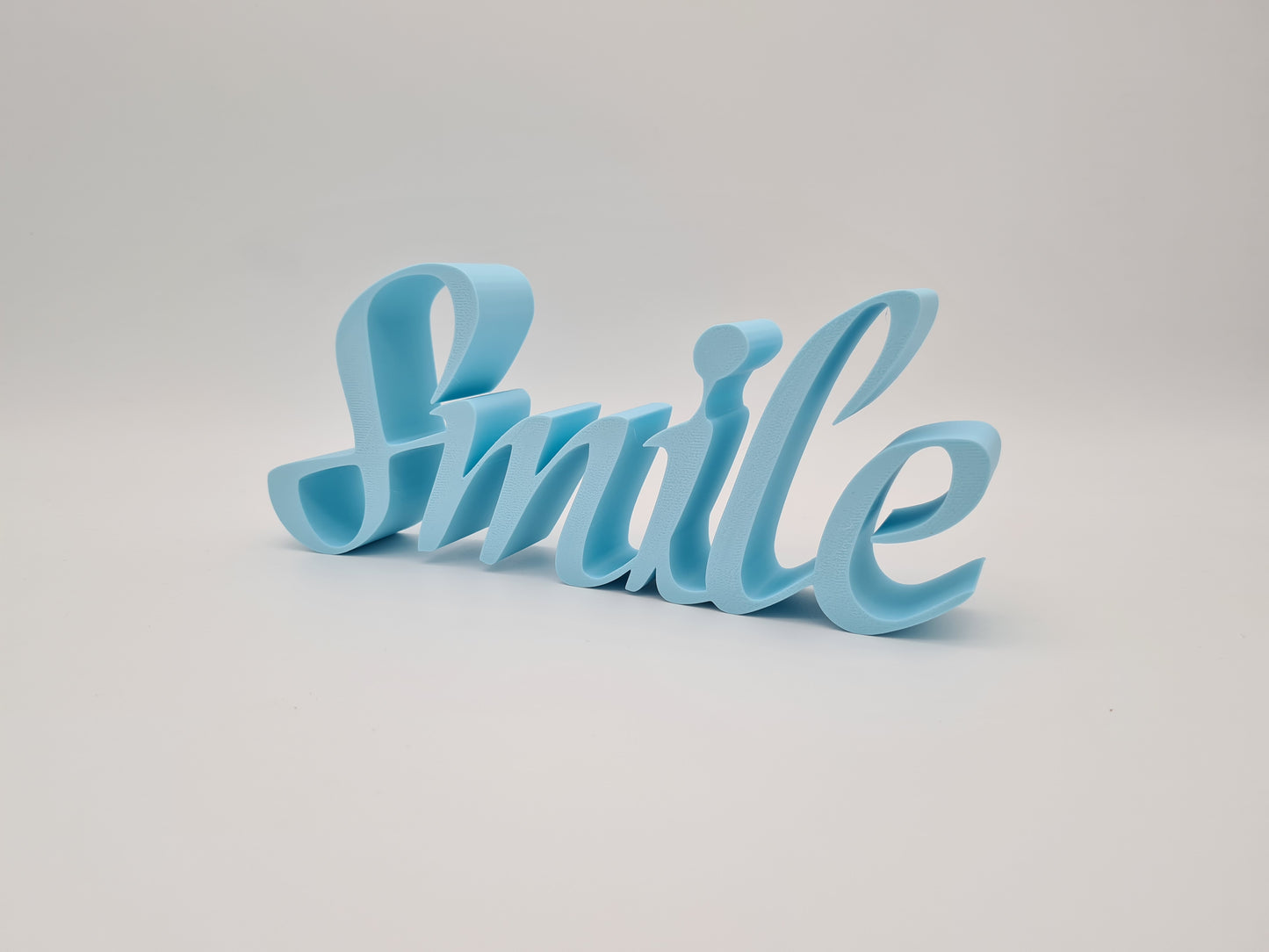 Dekorationsschriftzug Smile