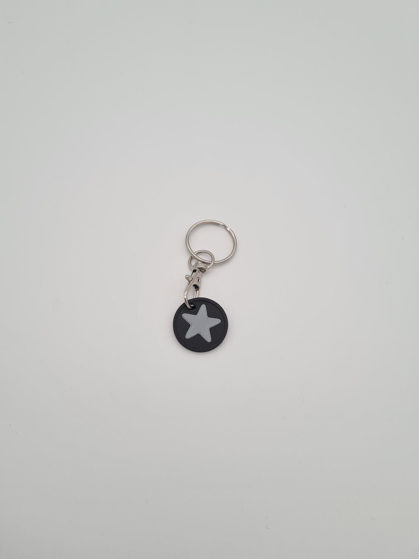 Schlüsselanhänger Einkaufwagenchip mit Stern Symbol
