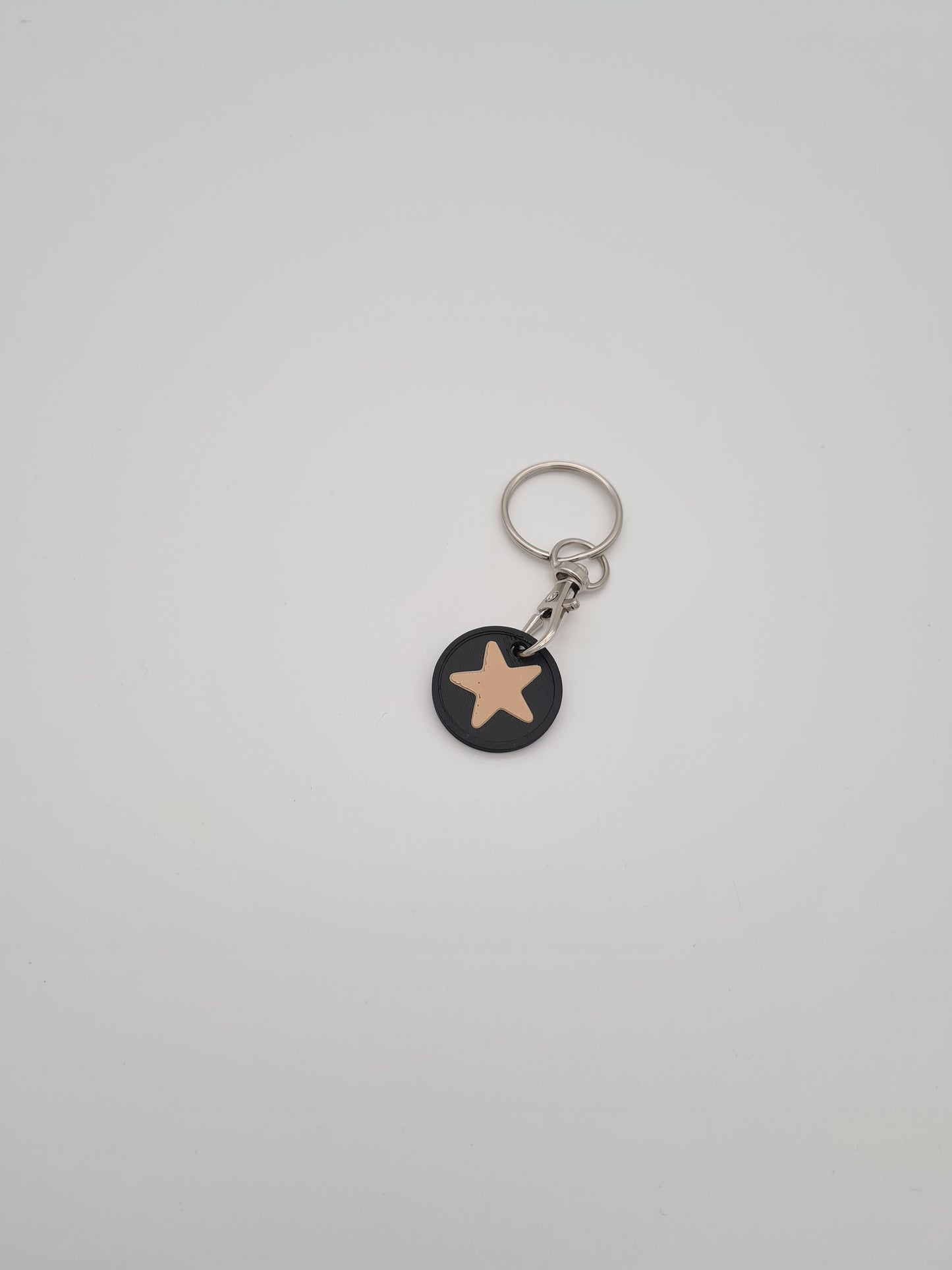 Schlüsselanhänger Einkaufwagenchip mit Stern Symbol