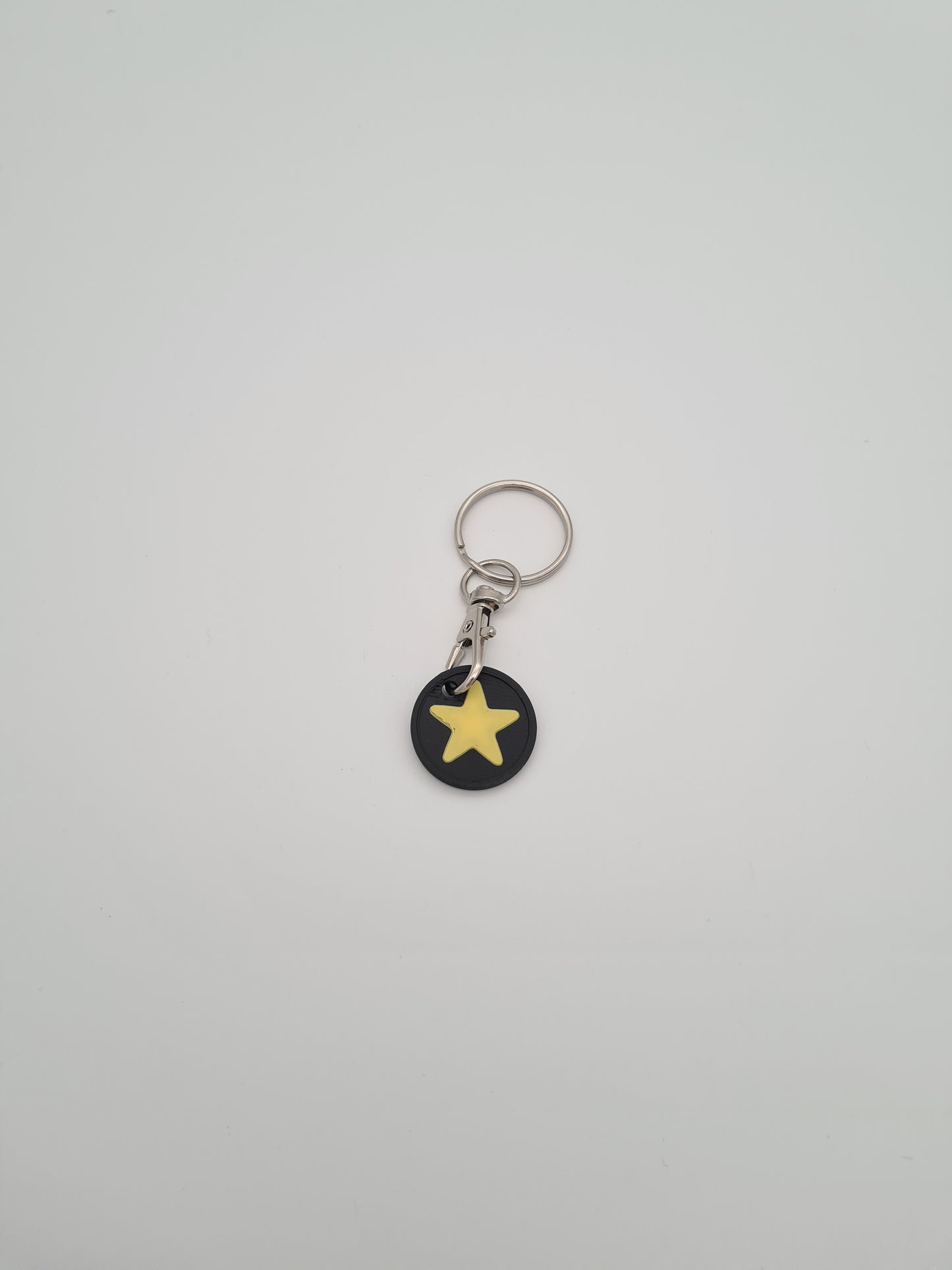 Schlüsselanhänger Einkaufwagenchip mit Stern Symbol