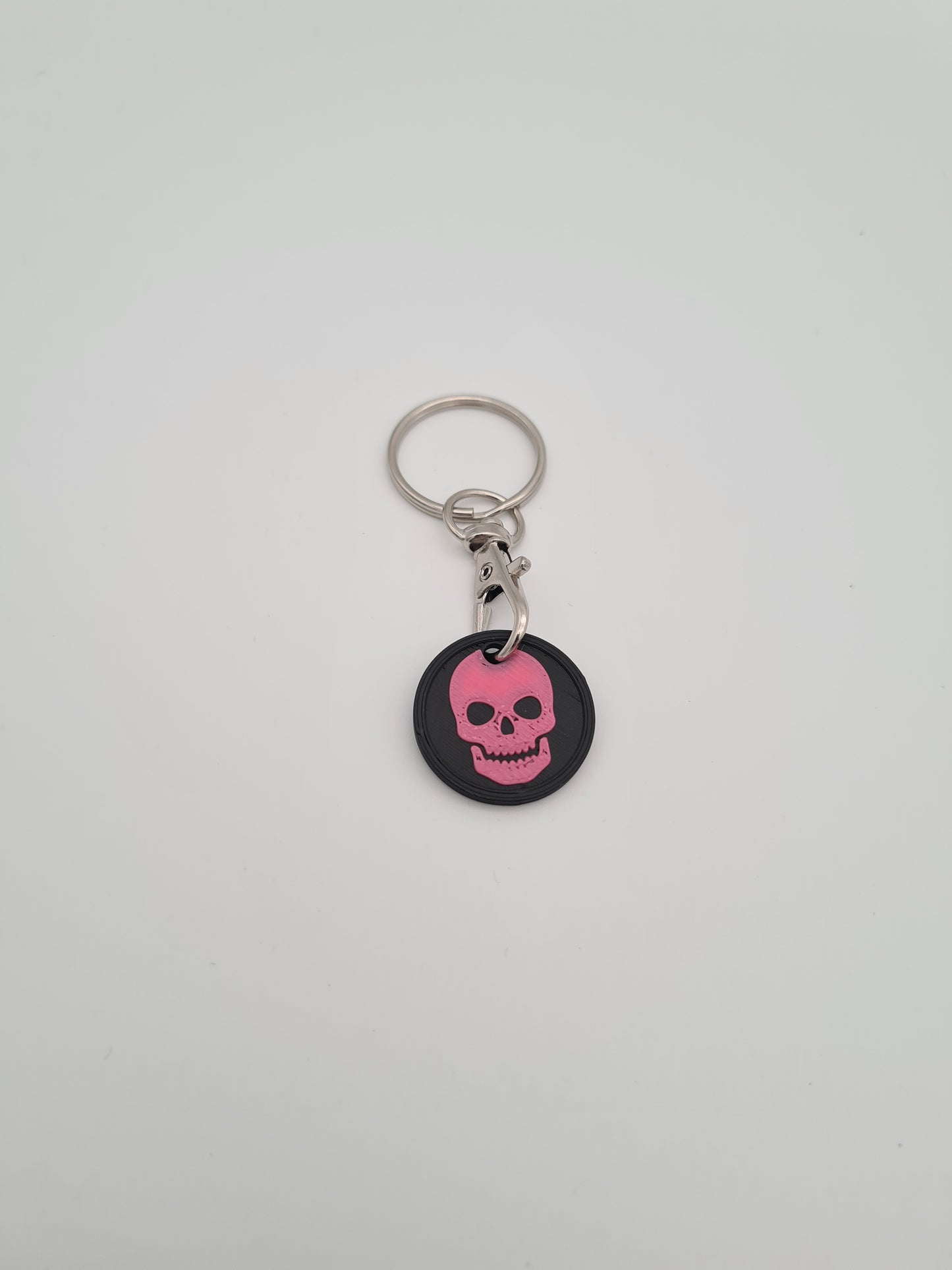Schlüsselanhänger Einkaufwagenchip mit Totenkopf Symbol