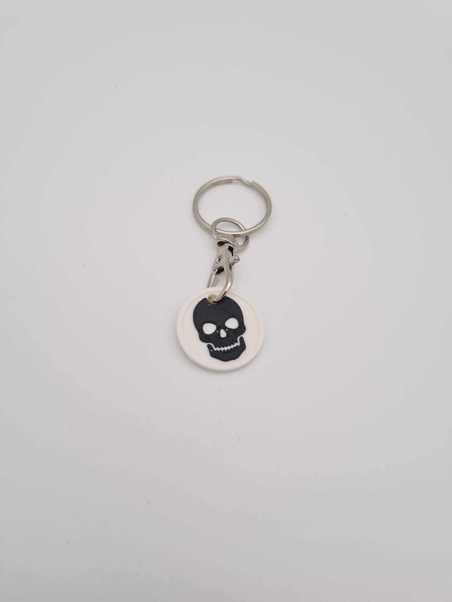 Schlüsselanhänger Einkaufwagenchip mit Totenkopf Symbol